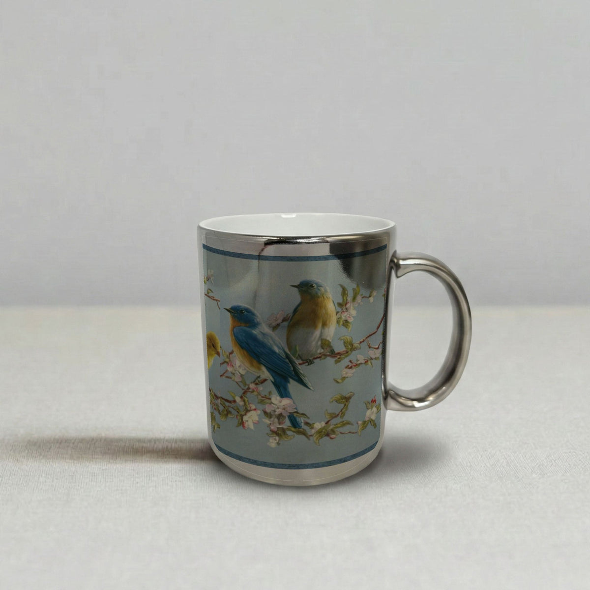 An Oriental Birds Chrome Silver Mug 11oz