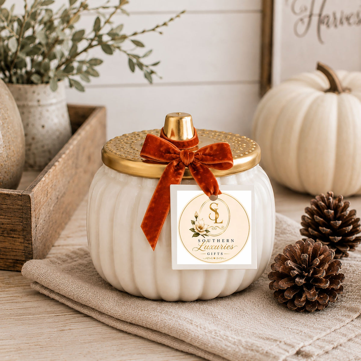 A Ivory Harvest Ceramic Pumpkin Candle