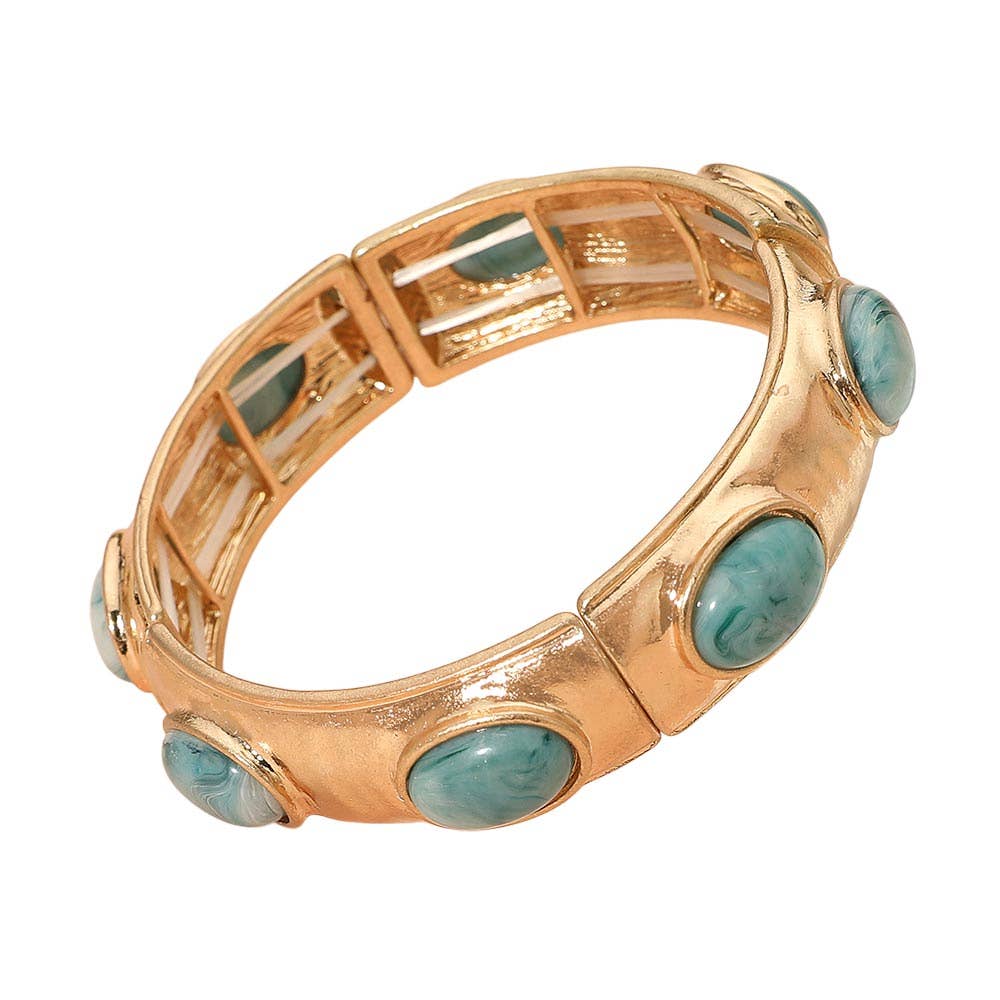 Bracelet extensible perlé en métal martelé avec pierre ovale marbrée