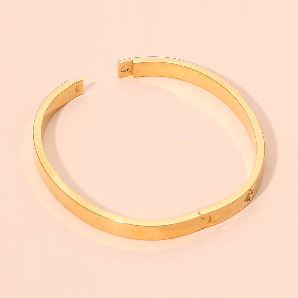 Bracelet jonc articulé en acier inoxydable avec pierres de zircone cubique
