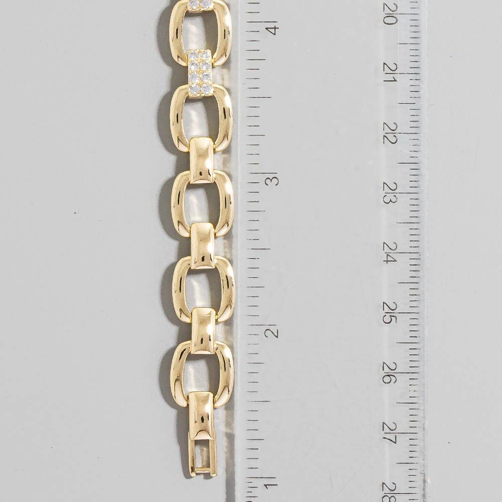 Le bracelet chaîne pavé de zirconiums trempés dans l'or « The Looks » par Fame